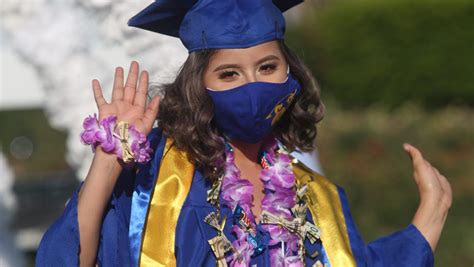 Photos: Drive-through grads from West Shore High School arrive in Indio