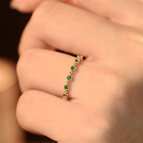 Celebrate your individuality with a custom birthstone emerald ring