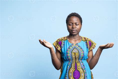 Female model praying to Jesus Christ for a miracle, expressing her