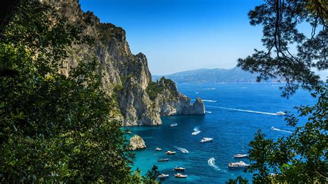 Download Capri Italy Rocky Cliff Wallpaper | Wallpapers.com