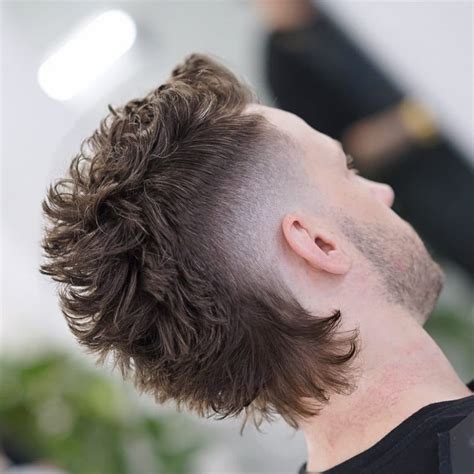 Peso Pluma's Hairstyle: The Story Behind His Mullet-Like Cut