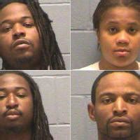 Four arrested after warrants served at two Opelika homes