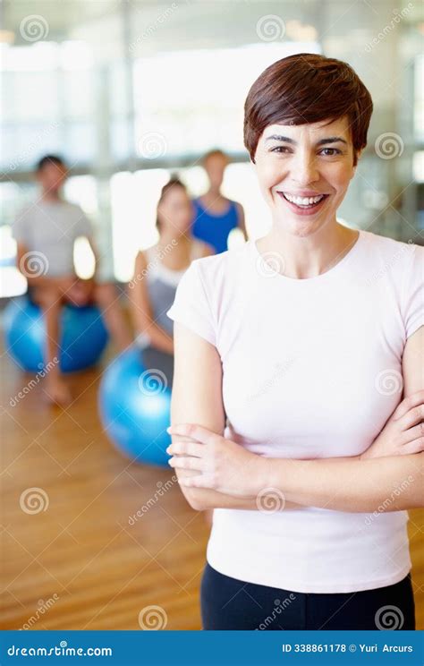 Woman, Portrait and Trainer with Arms Crossed in Yoga Class for Ball ...