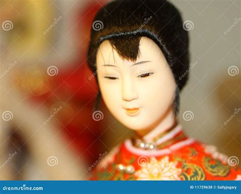 Boneca Chinesa De Porcelana - Boneca da porcelana foto de stock. Imagem de boneca, cabelo - 11729638