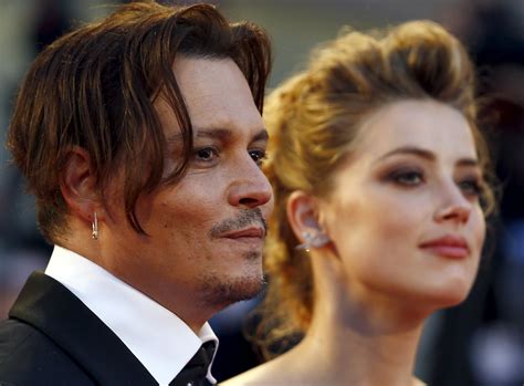 Amber Heard secures TRO against husband; Johnny Depp denies abuse claims