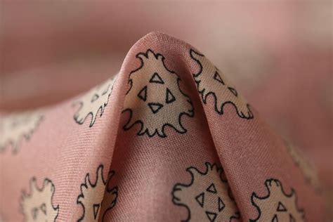 premium photo raised fabric  corner  sewing clothes  bed