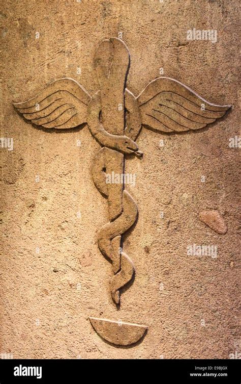 Ancient pharmacy with the symbol of medical caduceus Stock Photo - Alamy