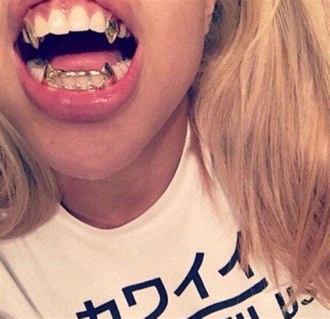 [SINGLE TOOTH] SILVER VAMPIRE FANG GRILL – Rhino Grillz