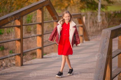 portrait  adorable  girl  yellow leaves bouquet  fall