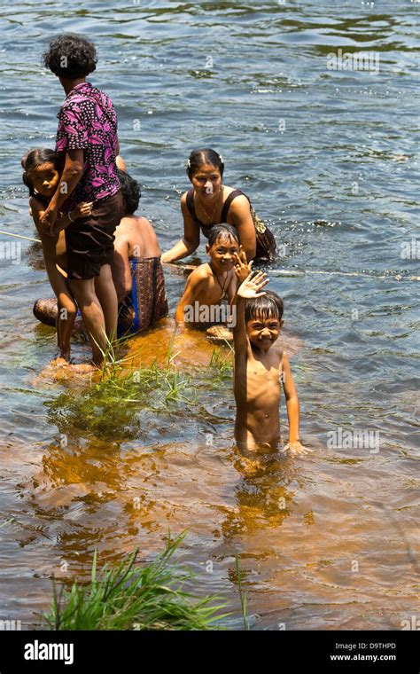 Local People taking a Bath in the River at the Teuk Chhou Rapids in the ...