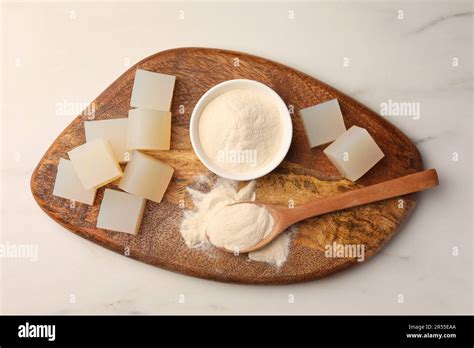 jelly cubes  powder  white marble table top view stock