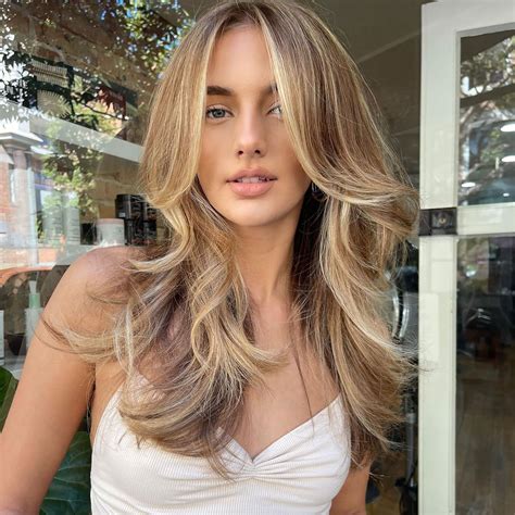 33 Wolf Cut Hair Ideas For 2024, Whether You're Grunge, Glam or Edgy