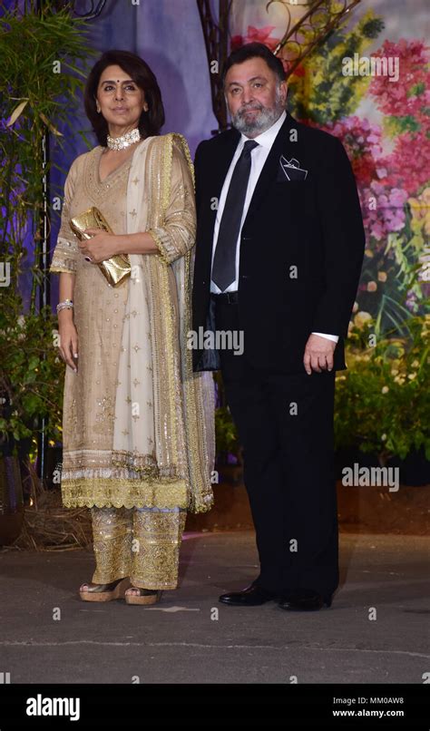 Indian film actor Rishi Kapoor with wife Neetu Kapoor attend the ...