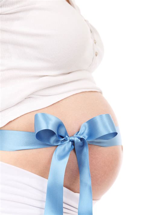 Download Pregnant Belly With Blue Ribbon Wallpaper | Wallpapers.com