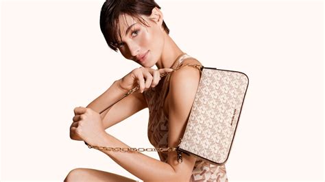 michael kors unveils  empire signature logo collection  fall