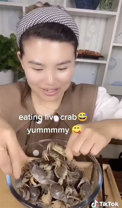 Woman eating live crabs shocks, divides viewers: ‘That’s very messed up