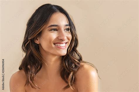 Smiling brunette woman Stock Photo | Adobe Stock