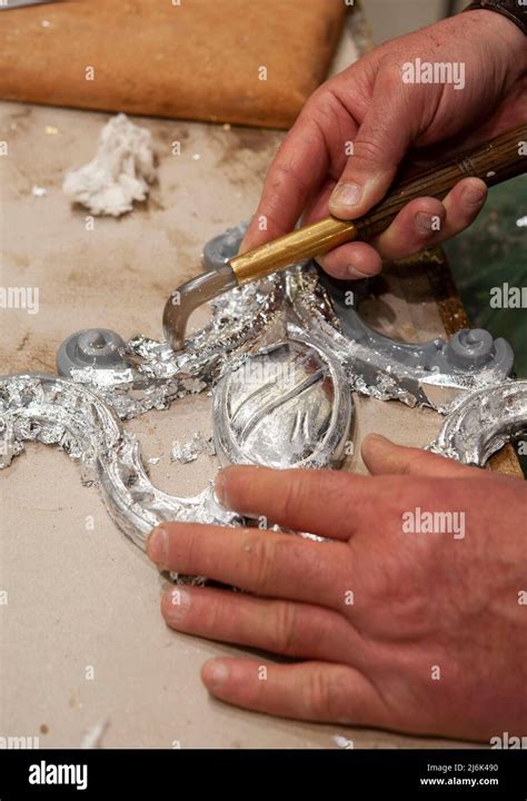 Silvered frame ready for burnishing with an agate stone tool. Silvering ...