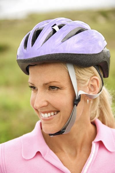 Woman wearing bike helmet Free Photo Download | FreeImages