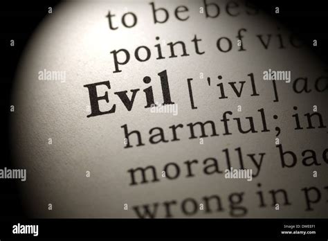 Fake Dictionary, Dictionary definition of the word Evil Stock Photo - Alamy