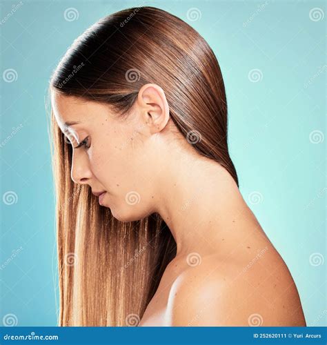 sleek hair   style studio shot   attractive young woman