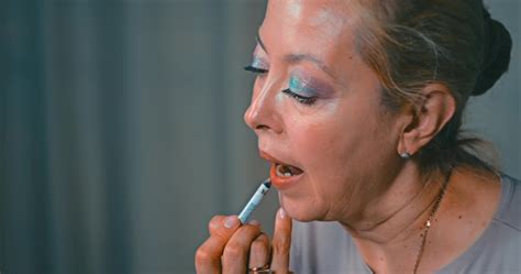 Age makeup. Lip liner with a contour pencil. Artistic Dynamic camera