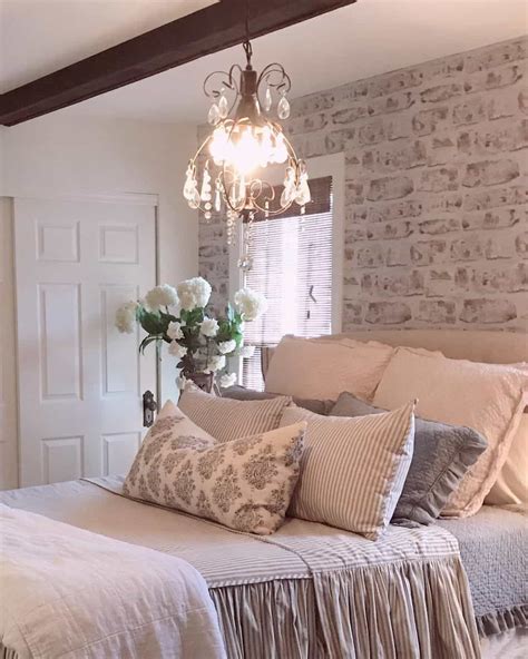 Chandelier Hangs From an Exposed Wood Beam - Soul & Lane