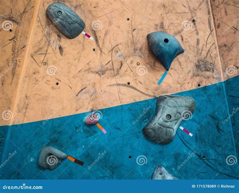 Strong Hooks on the Wall of the Climbing Wall. Training for Climbers ...