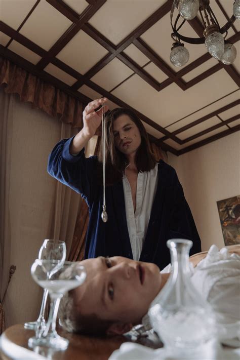 Download Blue Jacket Woman Doing Hypnosis Wallpaper | Wallpapers.com