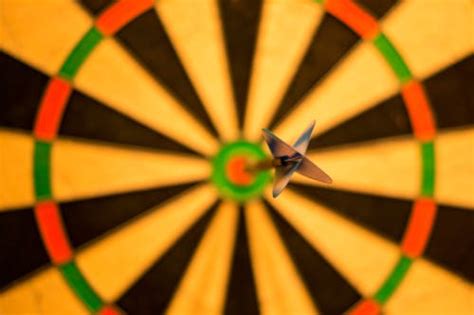 yellow  black dartboard  pins illustration  stock photo