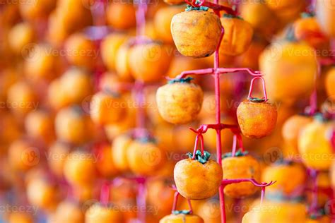 Hanged vietnamese persimmons, traditional food - Dried persimmons in
