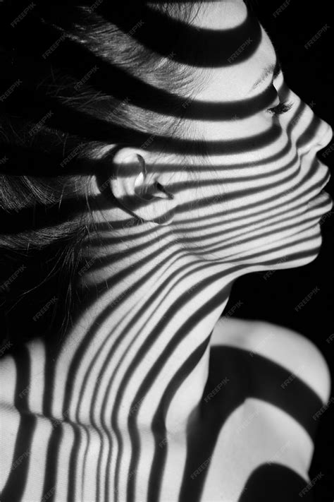 Premium Photo | The face of nude woman with black and white zebra
