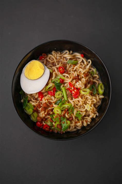 Download Exquisite Top View of Spicy Ramen Noodles Wallpaper