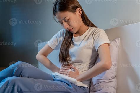 Flatulence ulcer, asian young woman in belly, stomach ache from food