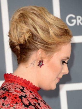 The Meaning Behind Adele’s Ten Tattoos