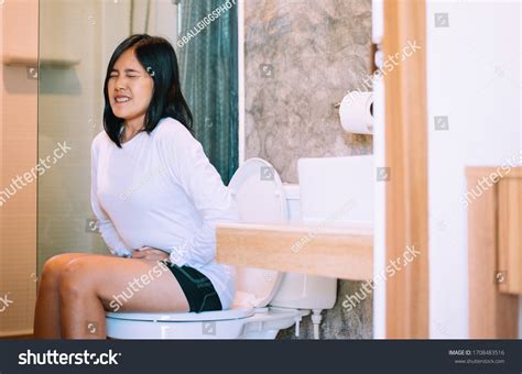 asian woman pooping immagini foto stock  grafica vettoriale