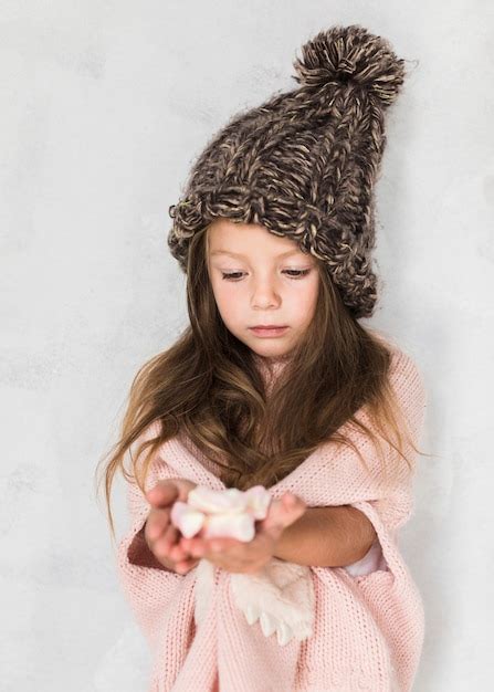 Free Photo | Adorable little girl wearing winter hat