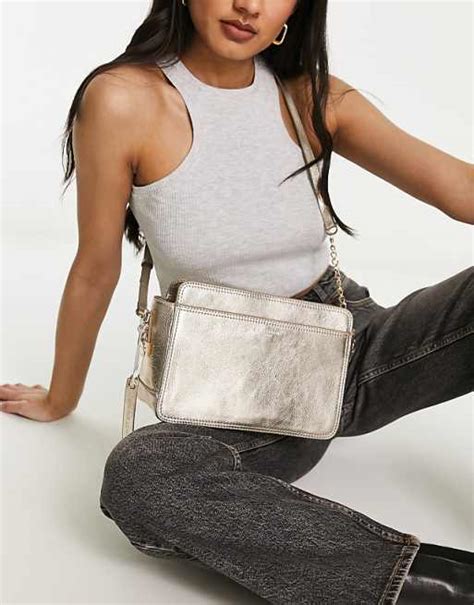 Paul Costelloe leather crossbody bag in metallic gold | ASOS