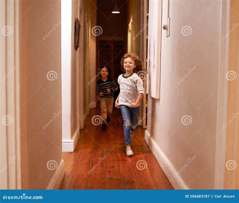 dont run   house  children running   hallway stock image