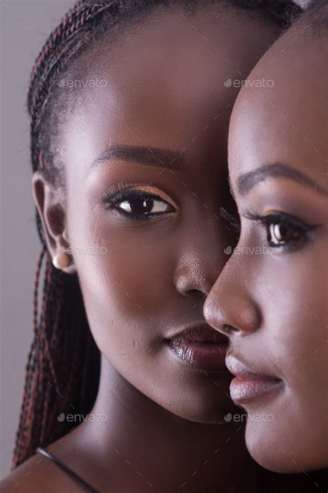 Two beautiful black African models Stock Photo by dazzlejam | PhotoDune