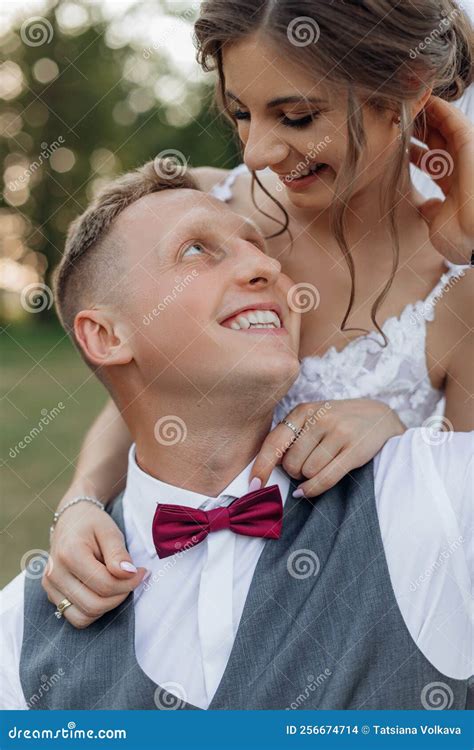 vertical closeup newly married couple  bride  wedding dress