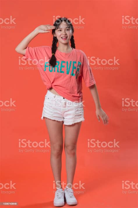 Cute And Naughty Asian Girl Stock Photo - Download Image Now - 20-29