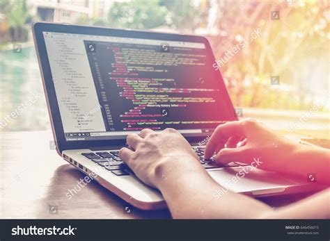 programming work time programmer typing  stock photo