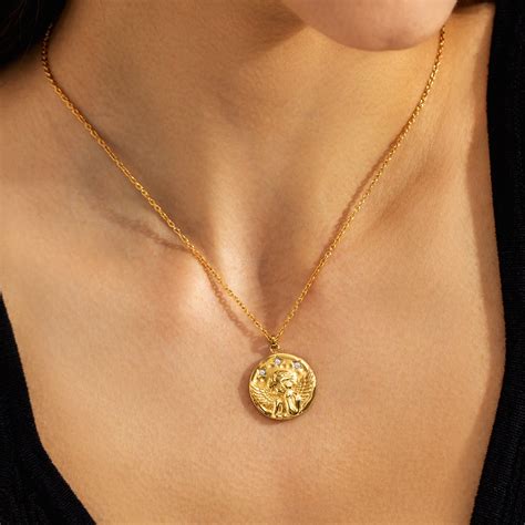 BABY ANGEL COIN PENDANT – Aurum and Glacier