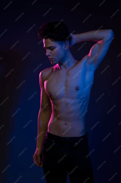 Premium Photo | Handsome pumped up guy with naked torsos Sports guy