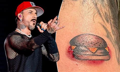 Backstreet Boys: AJ McLean gets a hamburger tattoo in Sydney | Daily ...