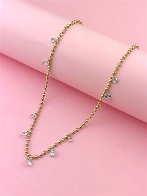 naszyjnik kulkowy  wiszacymi krysztalkami  coralove