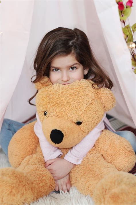 Free Stock Photo of Child hugging large teddy bear | Download Free ...