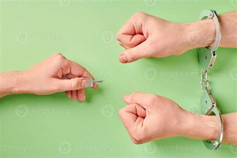 Release of prisoner. Hands in handcuffs 11307825 Stock Photo at Vecteezy