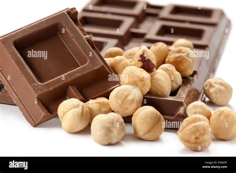 chocolate bar with nuts, on white background Stock Photo - Alamy